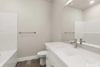 Images shown are from a different home previously constructed by this builder and are provided as examples of workmanship, finish quality, and design style only. The subject property is currently under construction, and specific materials, colors, fixtures, and features may differ upon completion.