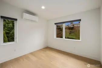 Additional bedroom with natural light and mini split