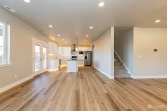 Living room area looking back at the large spacious kitchen