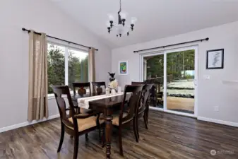 Dining room with slider out to the covered back deck..