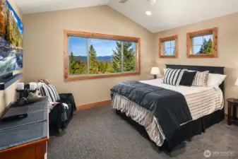 Upstairs guest bedroom with views to Peoh Point and the Stewarts.  Walk-in closet as well.