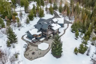 Overhead of the home in the snow.