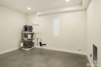The lower level includes a very large utility storage space with room for a washer/dryer and lots of storage!