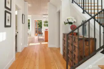 Gleaming solid wood floors grace the homes entry, living spaces and bedrooms.