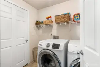 Laundry room directly off of living area. Garage beyond.