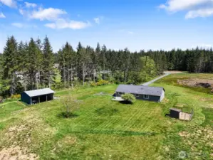 Note the large carport. Could be a shop w/ overhead garage doors!