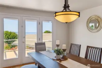 Easy come & go to the deck & views through the full-glass French Doors.