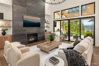 great room with floor to ceiling fireplace.
