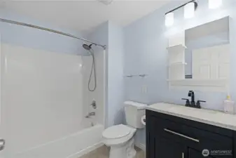 Beautifully updated full bath with clean finishes