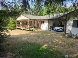 Main house with carport attached to other house