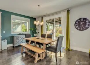 Dining area off the kitchen with sliding door leading out to the backyard