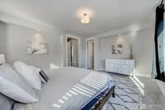Primary bedroom with walk-in closet and luxurious 5-piece ensuite
