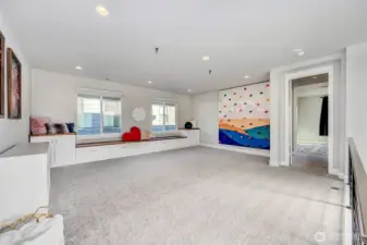 Kids rock climbing wall, built-in bench with storage