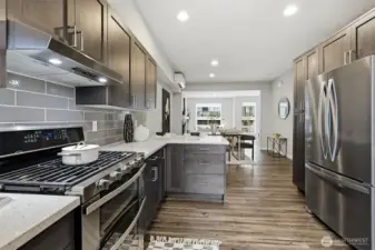 The kitchen has Stainless steel appliances.