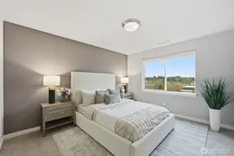 Primary Bedroom has ensuite bathroom and a walk-in closet.