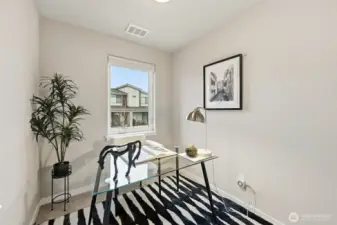 Office/media room upstairs adjacent to 2nd bedroom.