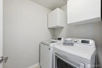 This townhouse has a full laundry room. No stackable appliances in hall closets here!