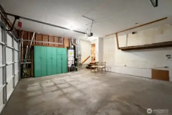 Over sized garage with garage door opener.  Newer water heater and quality furnace make their home here as well.