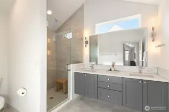 Dual sink vanity, with plenty of storage, & natural light