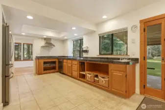 Kitchen offers lots of counterspace and views to the backyard