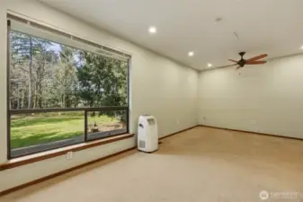 Large primary bedroom on 2nd floor with wonderful views of the back yard