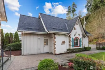 Charming detached ADU with storybook architectural details, offering a private and versatile living space.