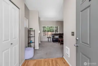 Formal entry with hardwood floor and large closet