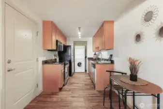 In unit washer and dryer makes laundry day convenient.