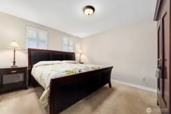The primary bedroom is the largest room and is just at the top of the stairs.