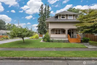 Another view of the home with the large side yard garden along Farragut Street, as well as off-street parking.