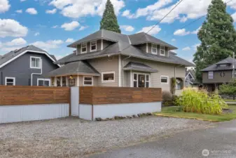 There are 3-4 off street parking spaces, as well as a vegetable garden along the Farragut Street side of the home.