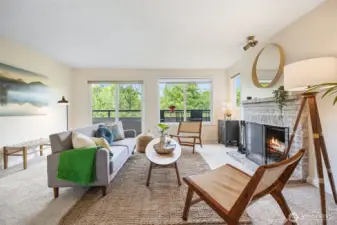 Living room with wood-burning fireplace.