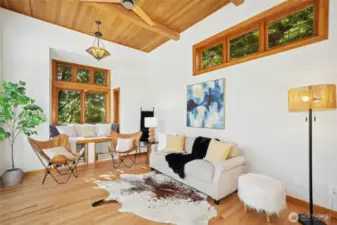 Brand new hardwood floors grace this room and make it Oh-So-Inviting! The windows bring in so much natural light yet the trees provide privacy