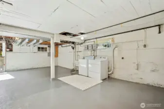 Basement partially finished room with laundry