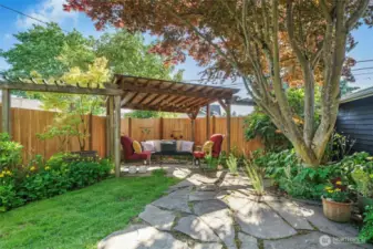 This yard has so many super features, with inviting places to hang out and relax