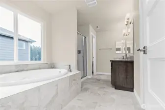 Home is under construction.  Photos, including virtually staged, are of a previously bult home in a different community with similar finishes.  Builder reserves the right to make changes to plans & specifications without notice.  Features vary by plan.  Buyer to verify square footage.