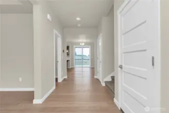 Home is under construction.  Photos, including virtually staged, are of a previously bult home in a different community with similar finishes.  Builder reserves the right to make changes to plans & specifications without notice.  Features vary by plan.  Buyer to verify square footage.