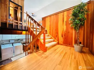 Looking down to main level to bedroom