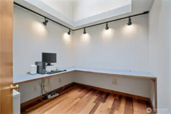 The office space is awesome and also has the Kempas wood floors and a huge skylight. The desk is built-in but could easily be removed if not needed.