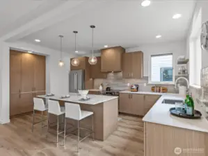 Cook & craft to your heart's content in this well-designed kitchen with island! Model home.