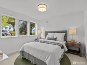 Main level bedroom with 3/4 bathroom just outside the door - Great for guests! Model home.