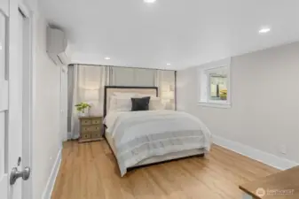 Featuring two oversized closets and large windows that flood the space with natural light.