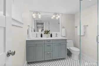 Beautifully appointed primary suite bathroom with elegant finishes and a clean, refined design.