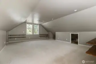 Oversized 2nd floor family room over garage with ample storage