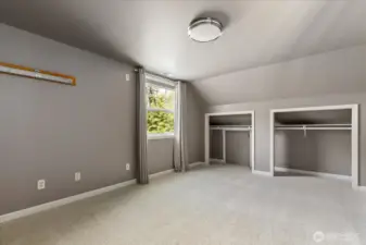 3rd upstairs bedroom with attic storage access thru barn door