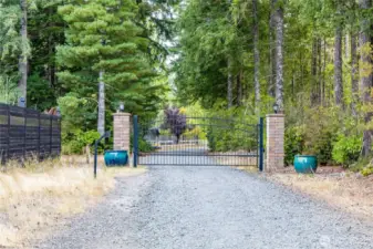 Gated community, lot is to the RIGHT of the gate.