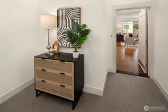 Come right in! Light, bright entry to move-in ready 2bed/2bath end unit