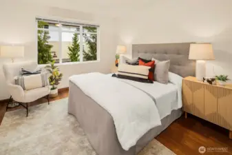 Generous primary suite with plenty of room for a king size bed