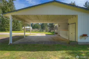 Ideal for guests, extended living, or potential rental opportunity.    Covered front porch provides a welcoming entry and a comfortable space to relax outdoors. Ideal for enjoying the peaceful surroundings and taking in the natural setting.