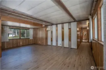 The open layout offers flexibility for multiple living spaces and easy flow into the rest of the home.